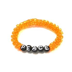 2/$12 Orange “Peace” Bead Bracelet